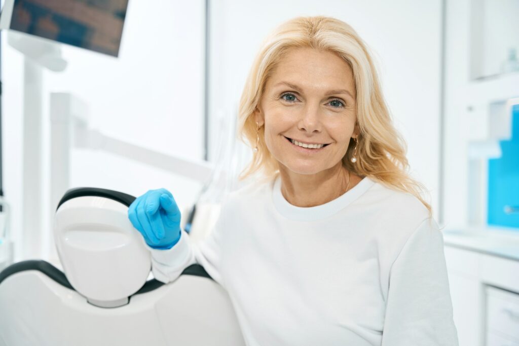 Female person waiting for patient in dental cabinet